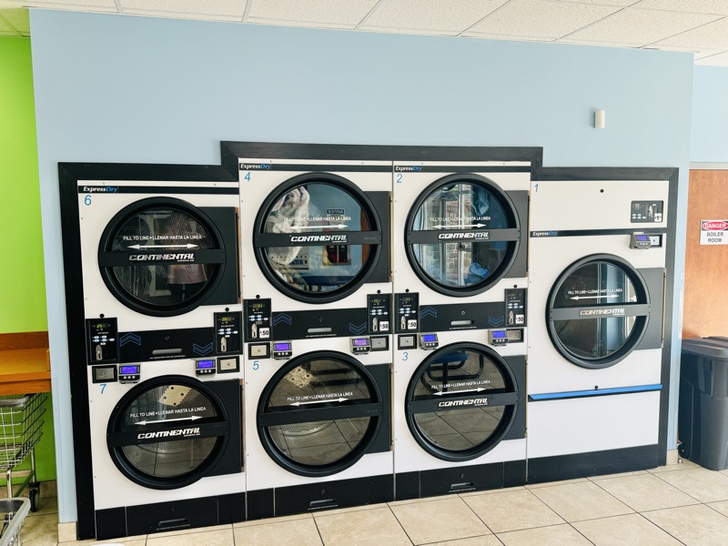 A bank of stacked ExpressDry dryers along the wall